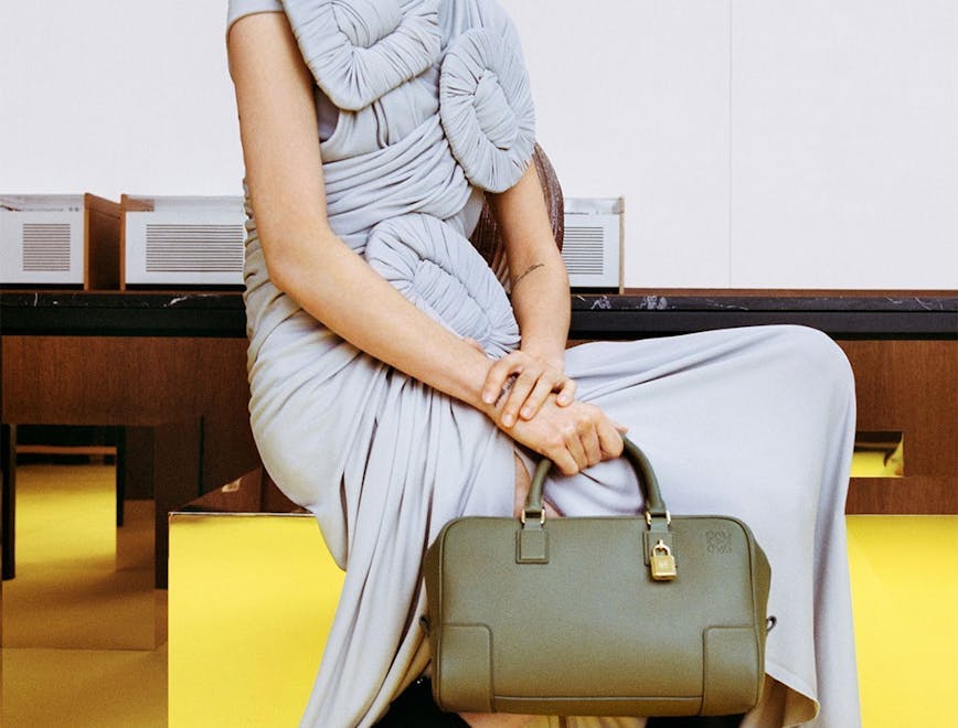handbag bag accessories accessory clothing apparel person human wood