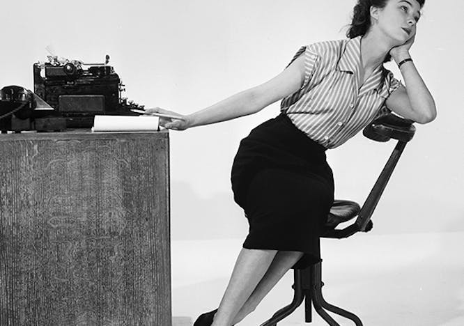 black & white;format landscape;female;office equipment;typewriter;telephone;cha 3210-2;m/com/offi/pers clothing apparel person human dance pose leisure activities