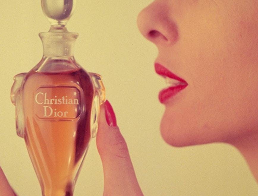 profile;close-up;format_portrait;color;brand name;bottle;perfume;female;hand;profile;elegance;glamour;fashion & clothing;advertising;beauty cosmetics;mc 3995;m/bea person human glass