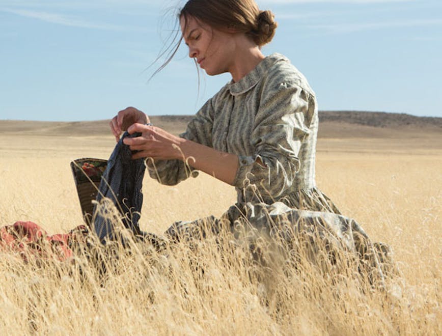 'the homesman' hilary swank scene 83b nature outdoors soil person human harvest countryside plant