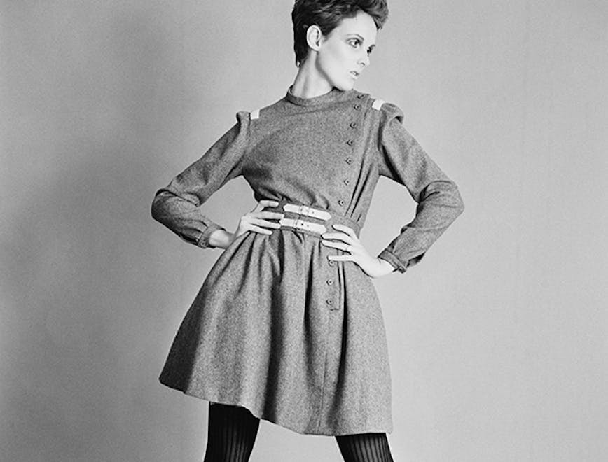 huty20228 black and white 1967 exp 1967 1984 fr 5 indoors one woman only three quarter length posed backdrop studio shot hands on hips fashion model clothing apparel dress female person human woman sleeve long sleeve