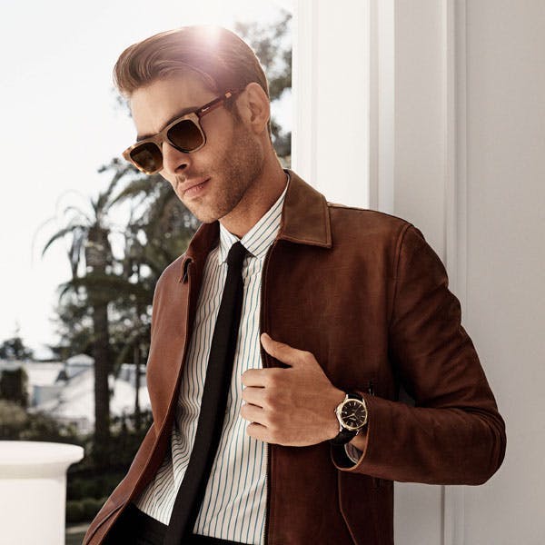 clothing sunglasses accessories tie jacket coat person blazer suit overcoat