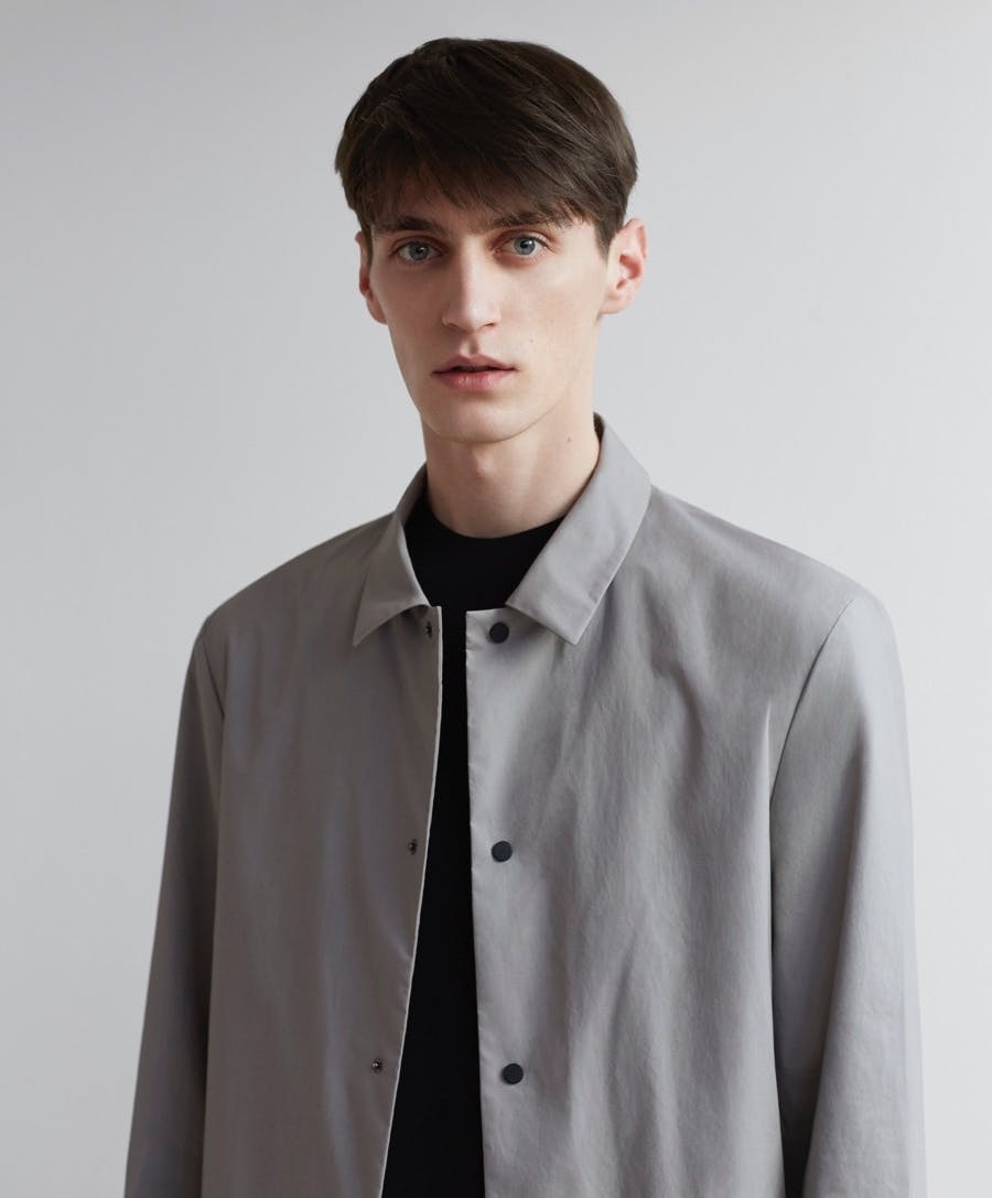 clothing apparel person human shirt sleeve coat long sleeve
