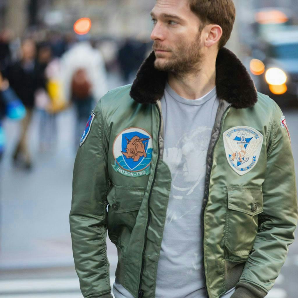 jacket coat clothing apparel person human sleeve