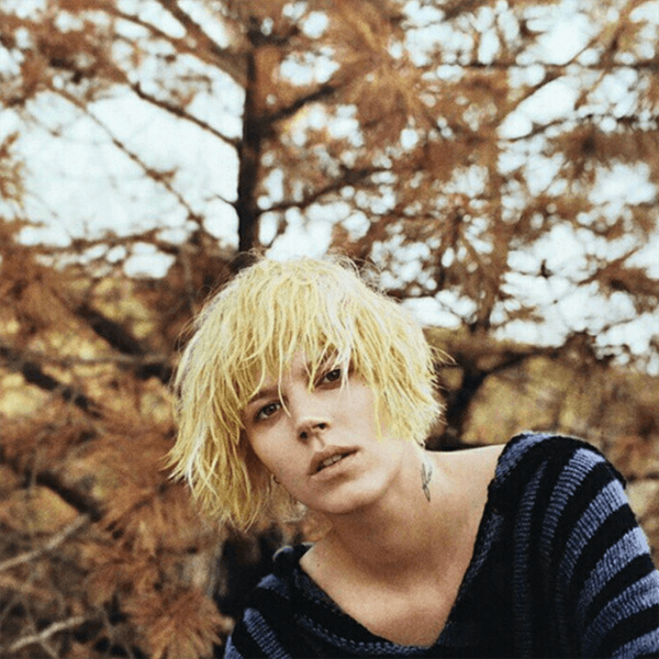 blonde kid person female teen woman home decor hair tree plant
