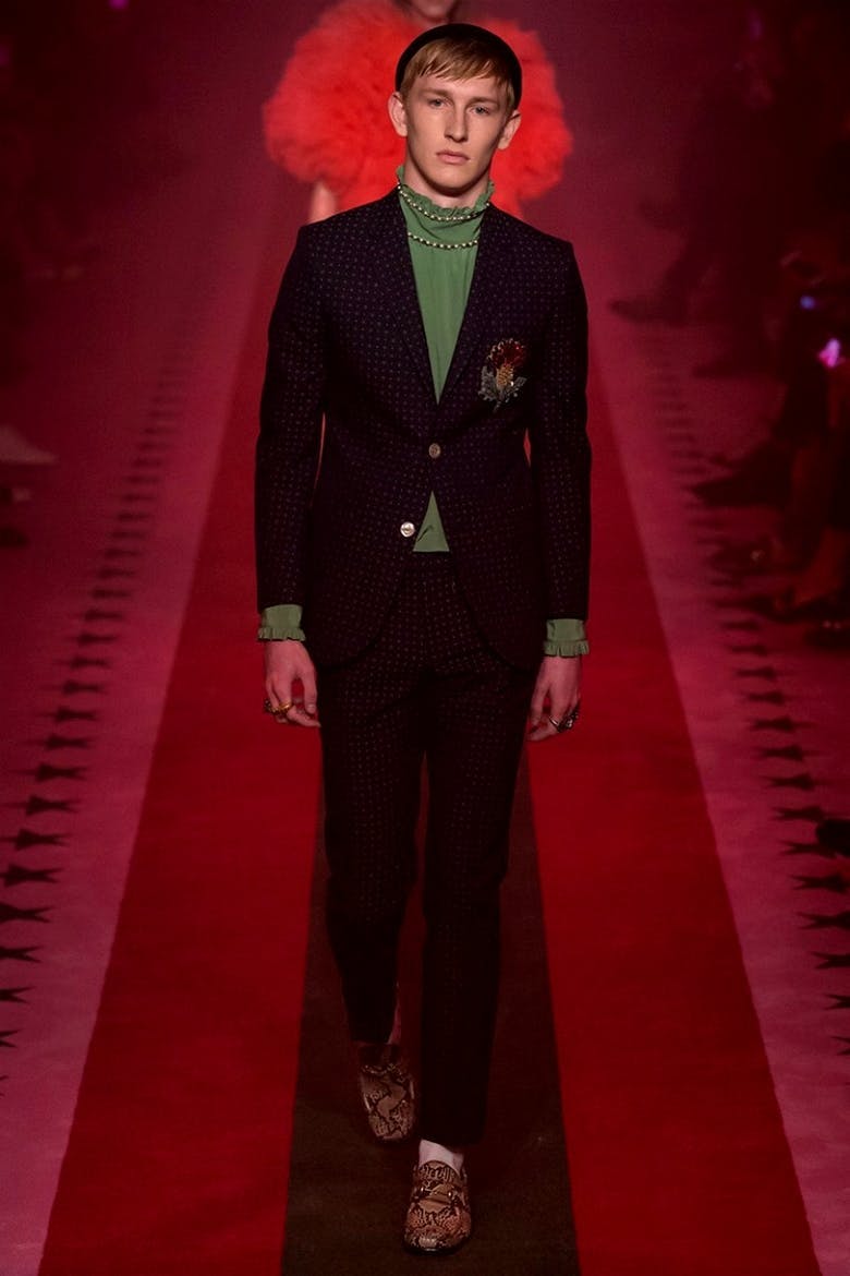 fashion premiere person suit clothing coat overcoat shoe footwear red carpet