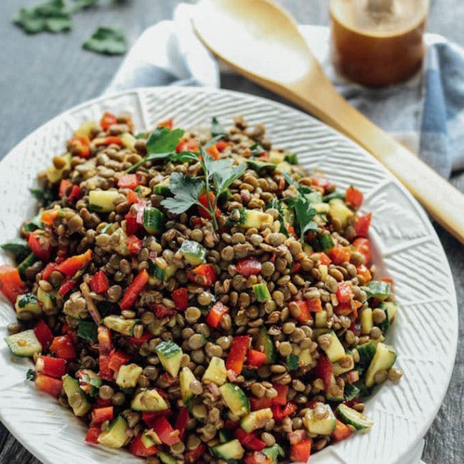 plant produce food spoon cutlery vegetable lentil bean