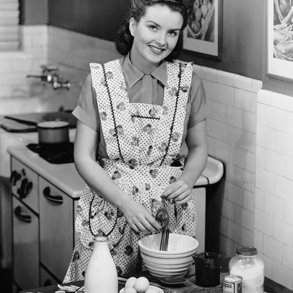 adult baking female females food food preparation house house work housewife indoor lifestyle nostalgia people person photodisc preparation smile vintage woman women work retro person human indoors room