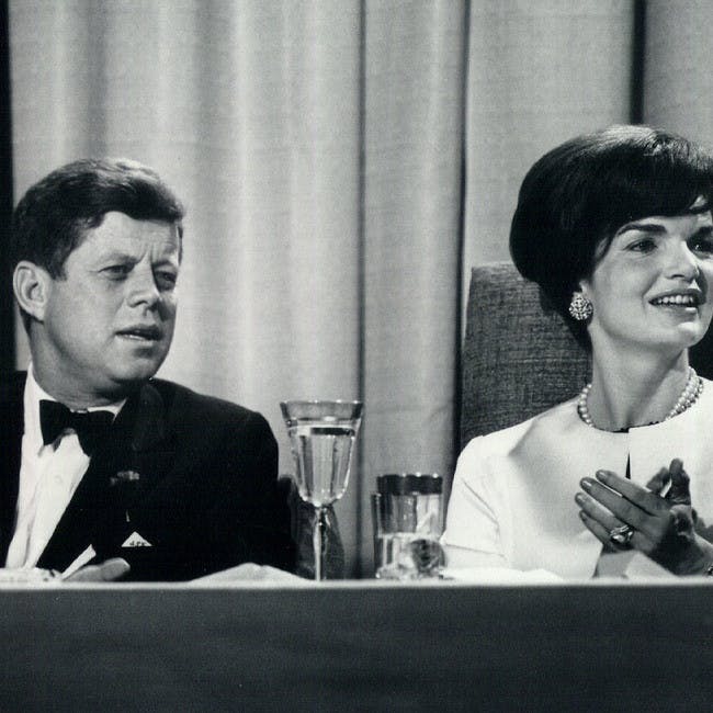 jfk jacqueline route aa db gs ball black and white photography black tie couple event fashion first lady formal gala historic history political politics presidential tuxedo archival washington dc person human sitting suit clothing coat overcoat apparel