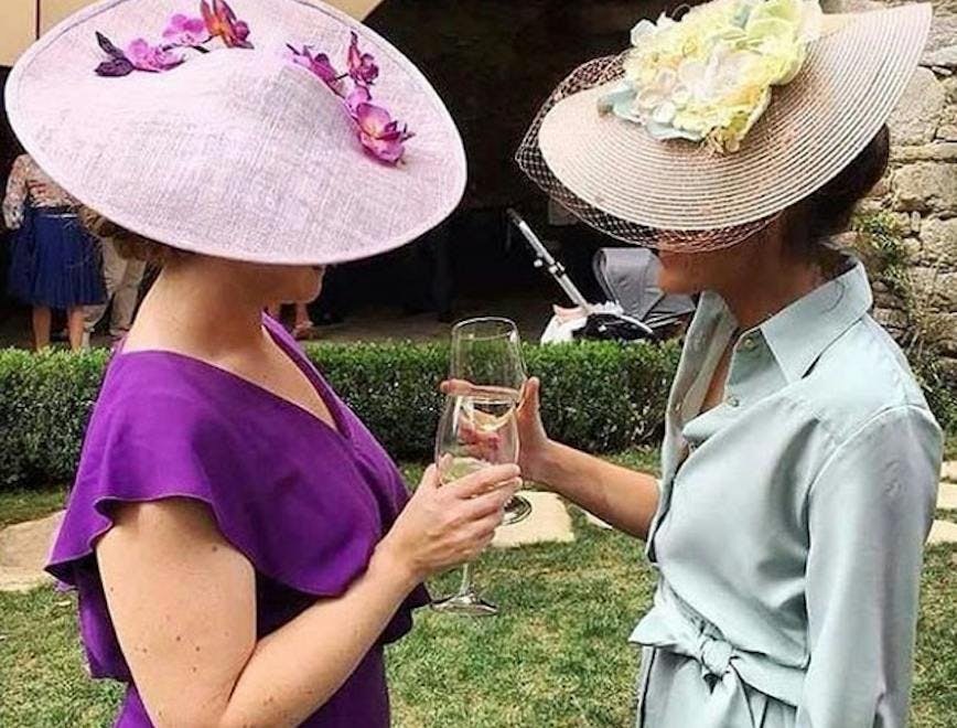 clothing apparel person human dress hat sun hat female beverage drink