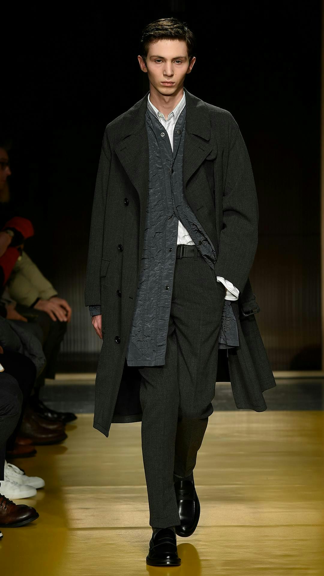 clothing apparel overcoat coat person human shoe footwear suit