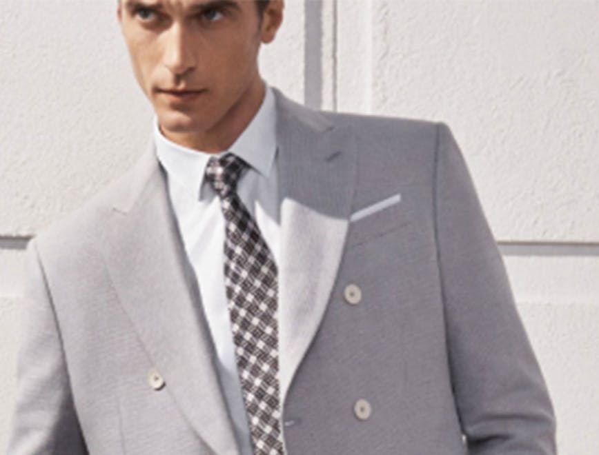 tie accessories clothing apparel suit overcoat coat blazer jacket person