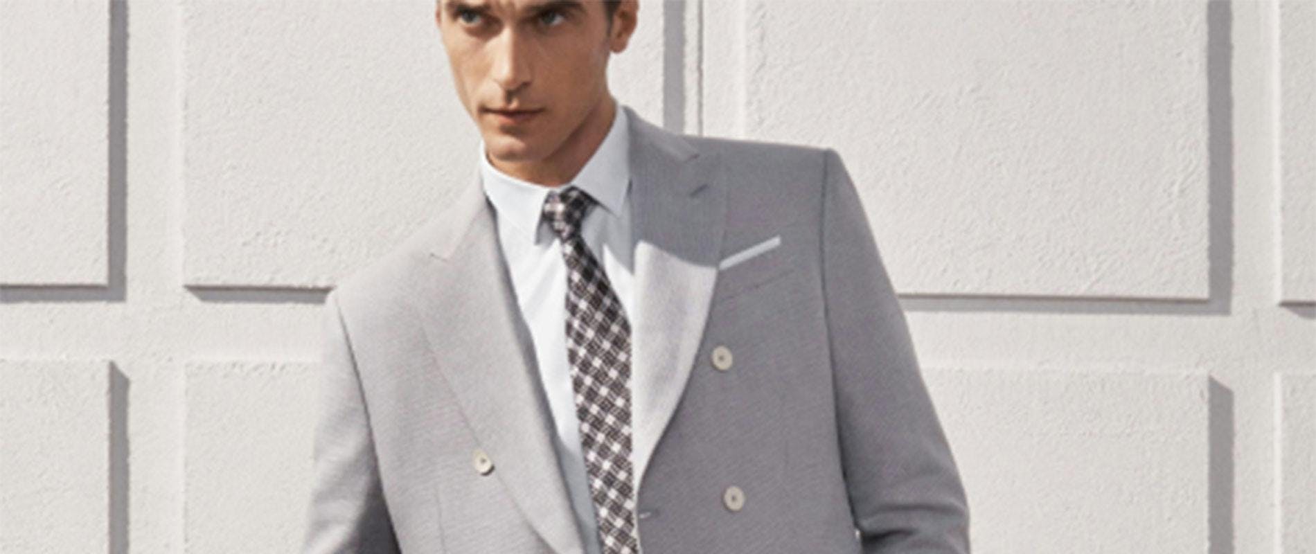 tie accessories clothing apparel suit overcoat coat blazer jacket person