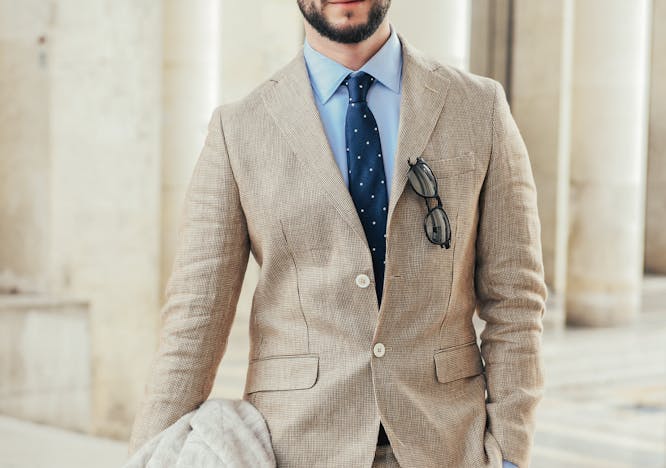 clothing tie accessories suit overcoat coat person man blazer jacket