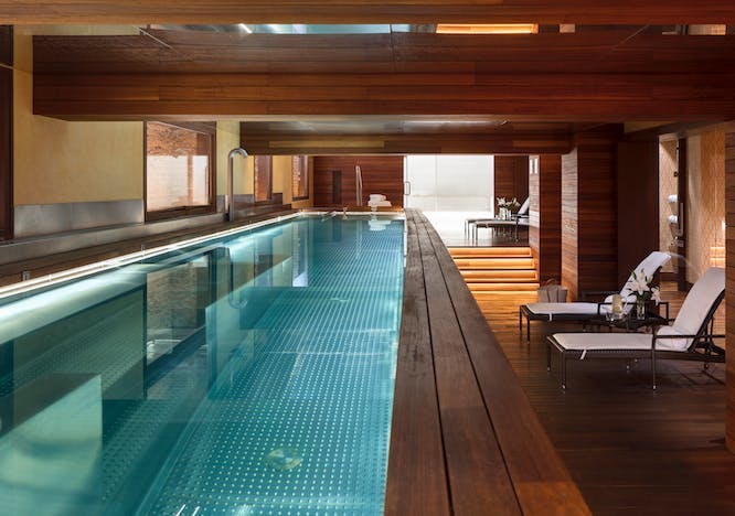 pool water swimming pool indoors interior design floor flooring architecture building wood